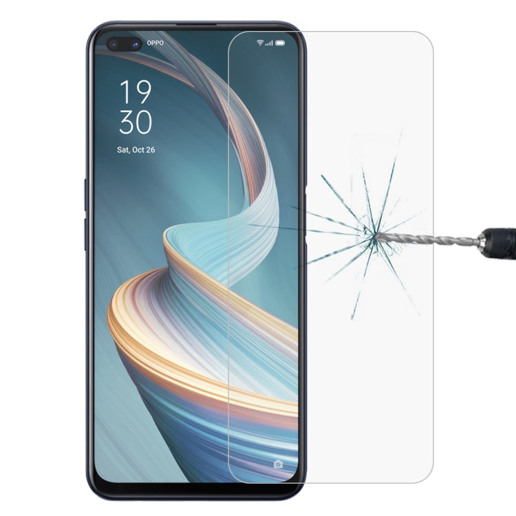 Tempered glass screen protector installed on smartphone screen with clear protective cover
