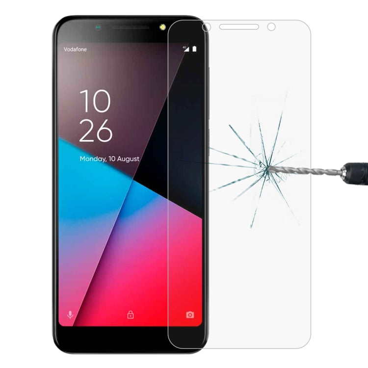 Tempered glass screen protector fitted on phone screen with impact crack