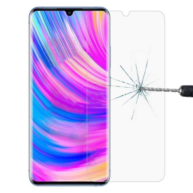 Clear tempered glass screen protector film covering phone screen with impact crack