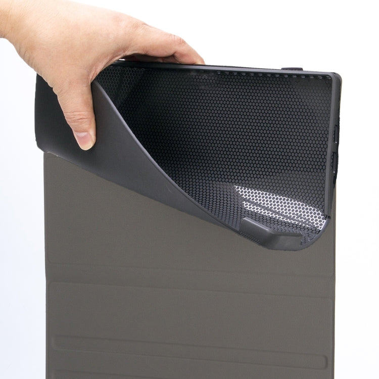 Detachable keyboard folio case close-up, dark gray textured interior, held by hand