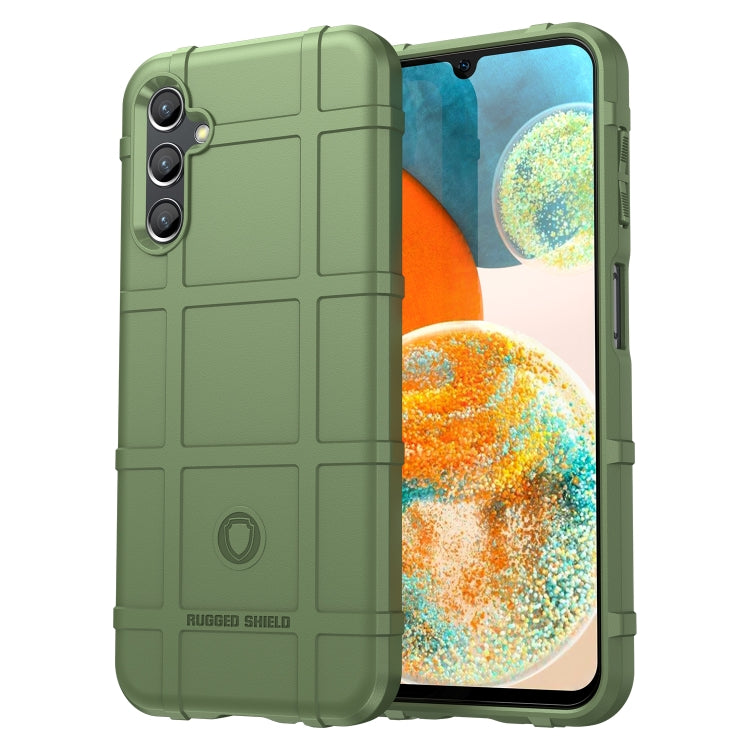 Rugged green TPU phone case with textured back, camera cutouts, and side buttons