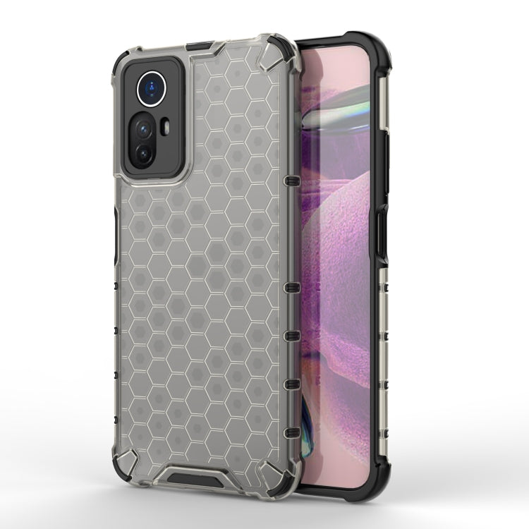 Shockproof honeycomb phone case with clear hex back, black edges, and camera cutouts