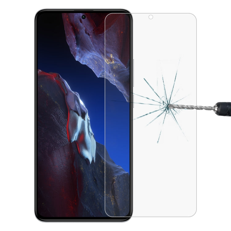 Clear tempered glass screen protector for smartphone display, impact crack visible