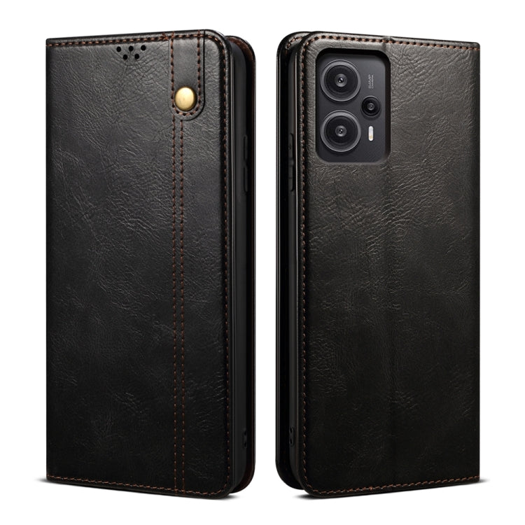 Black flip leather phone case with circular snap and dual camera cutouts