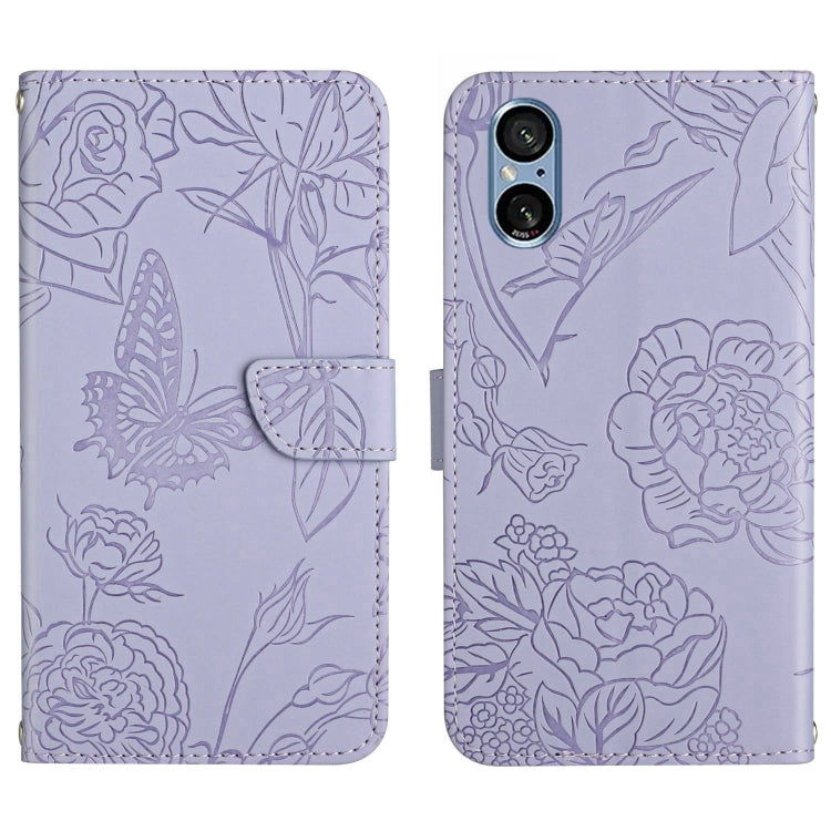 Lilac butterfly embossed flip leather phone case with side folding flap and floral pattern