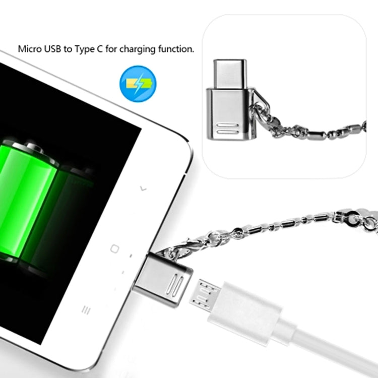 Micro USB to Type-C adapter chain charging a phone, USB connector shown