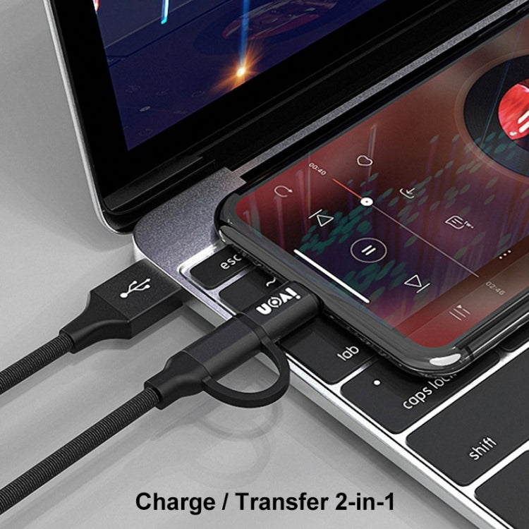 Dual-connector USB to Type-C and Micro USB charging cable plugged into a phone