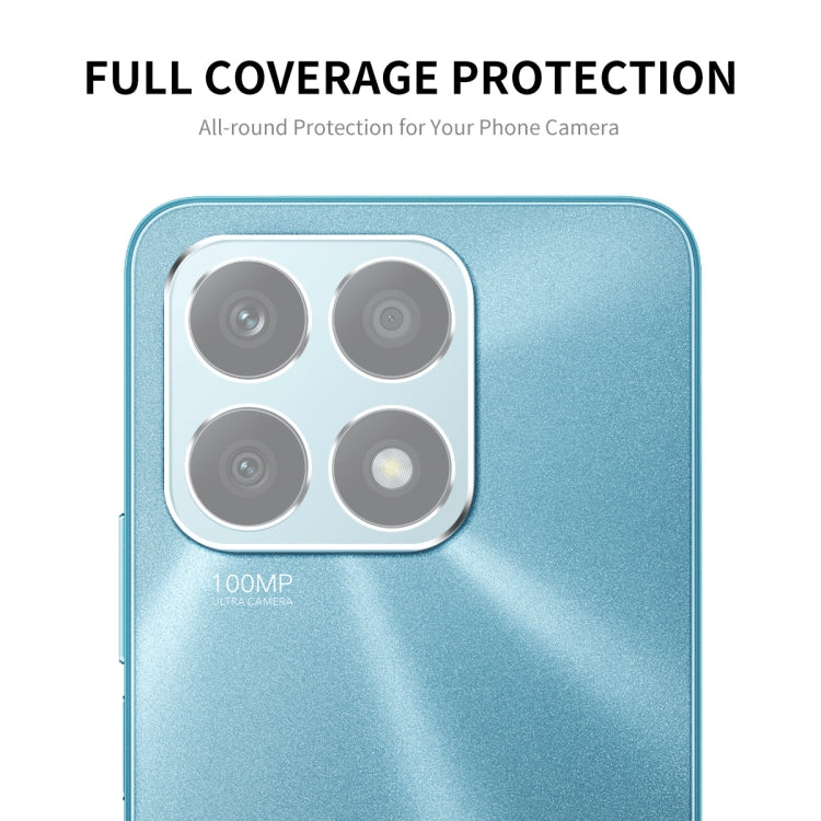 Full coverage tempered glass film over four rear camera lenses on blue phone back