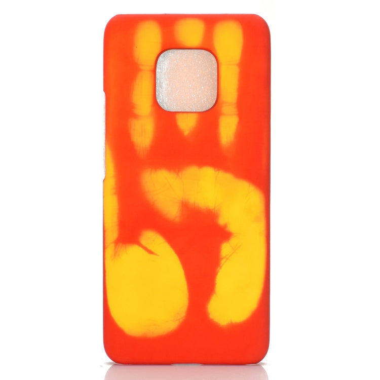 Smartphone thermal discoloration case with orange and yellow patterned back and camera cutout.