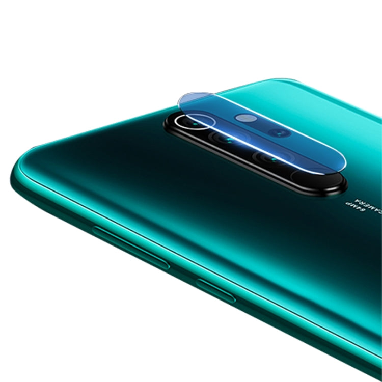 Tempered glass rear camera lens protector on turquoise phone, rounded 2.5D edge