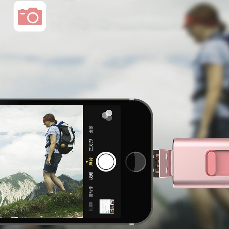 Rose gold 4-in-1 USB OTG flash drive connected to a smartphone