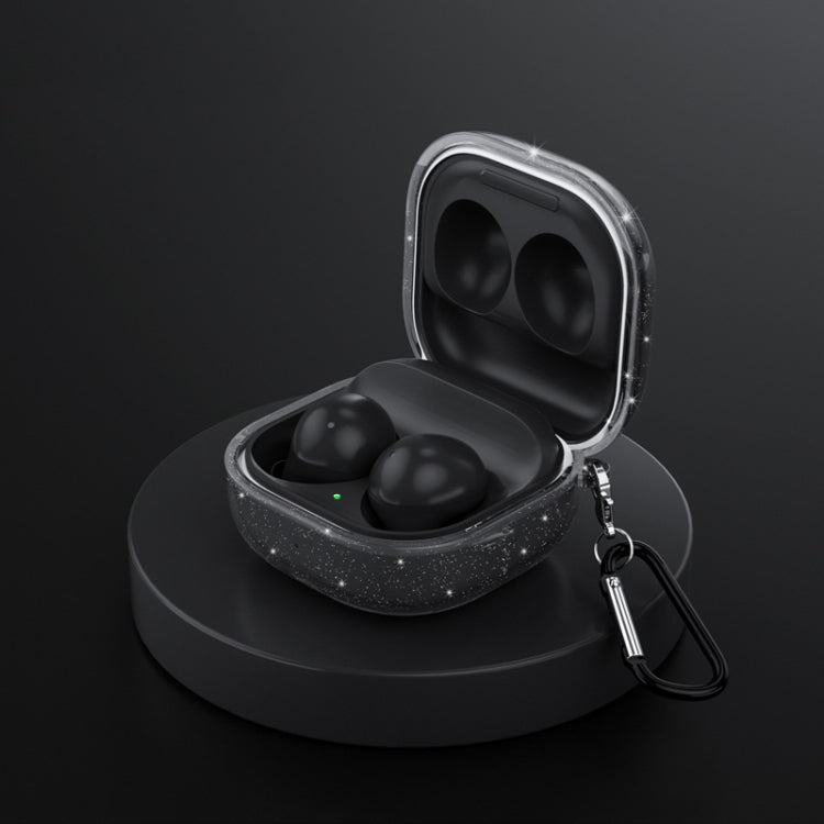 Glitter black TPU earbud case with open lid, showing two black earbuds and keyring