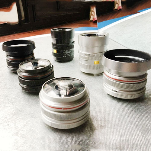 Set of six dummy DSLR lens models with visible front glass openings