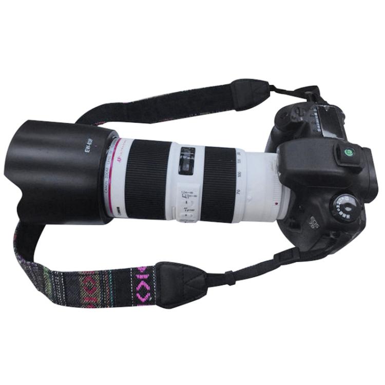 Black camera dummy with white 70-200 telephoto lens and fabric strap