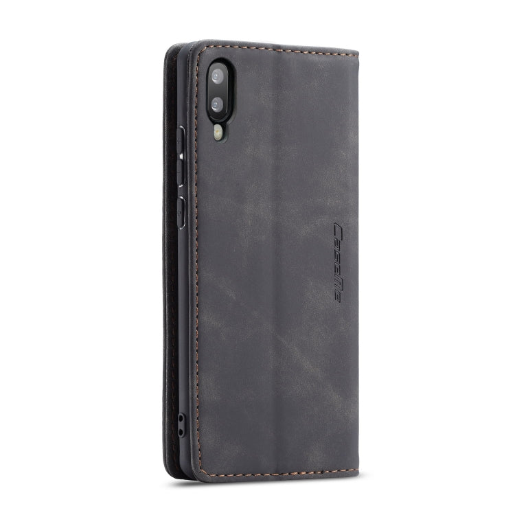 Dark gray leather phone case back view with camera cutout and stitched trim