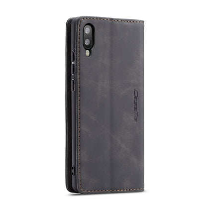 Dark gray leather phone case back view with camera cutout and stitched trim
