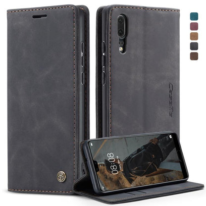 Dark gray leather wallet phone case in stand mode with camera cutout and stitching