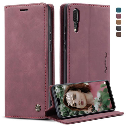 Wine red leather flip phone case with vertical cutout and fold-out screen stand