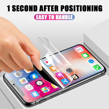 Hydrogel screen protector film being placed by hand on a smartphone screen