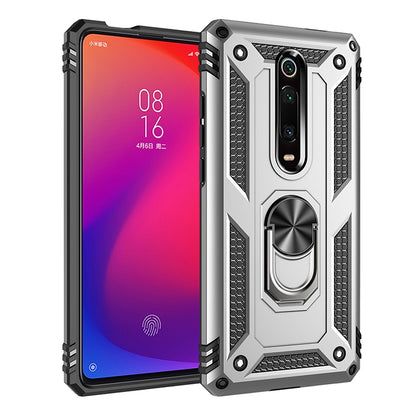 Protective phone case with raised corners, textured grip, and rotating ring holder in silver
