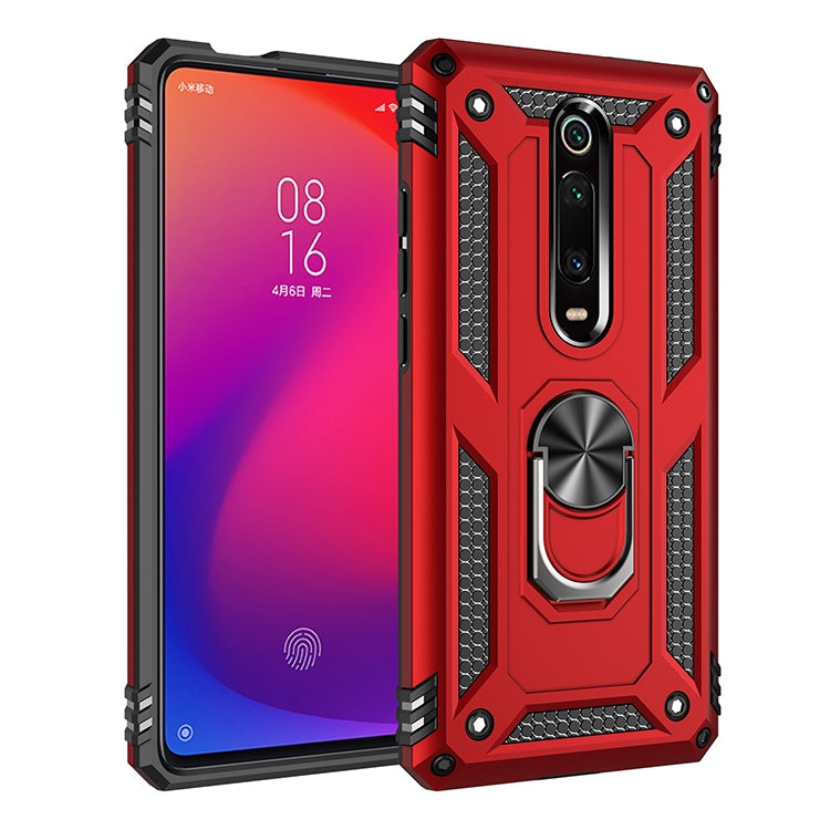 Protective phone case with raised corners, textured grip, and rotating ring holder in red