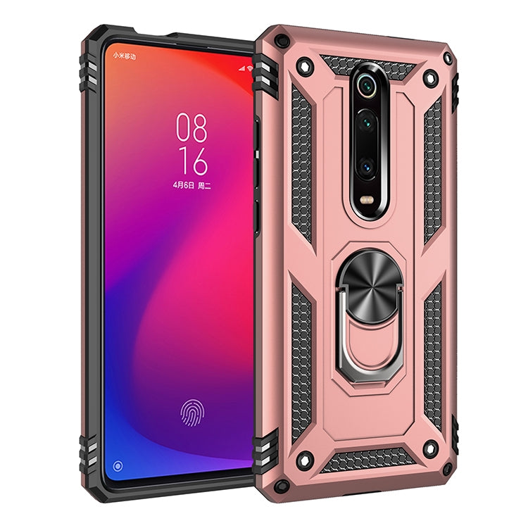 Protective phone case with raised corners, textured grip, and rotating ring holder in rose gold