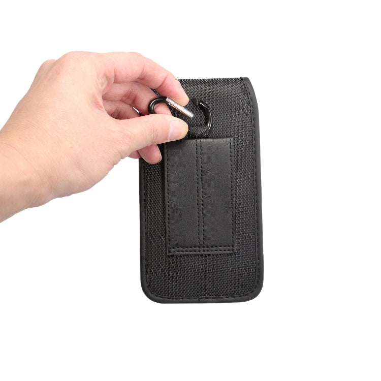 Black waist phone bag with hand pulling the top carabiner clip