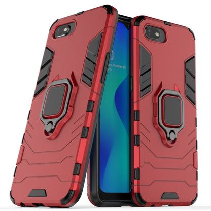 Rugged red protective phone case with magnetic ring holder; dual-tone back view