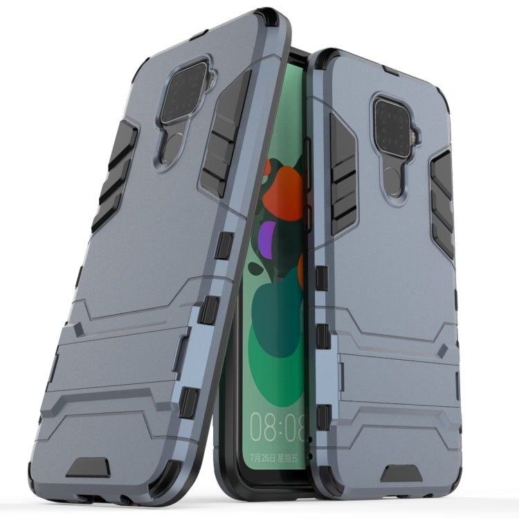 Rugged shockproof phone case with raised edges and camera cutout, light blue-gray