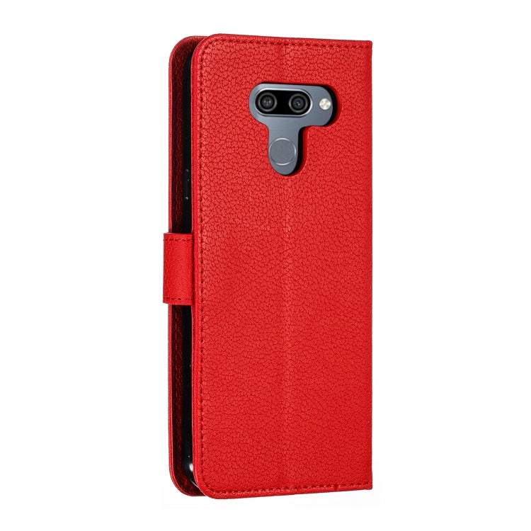 Red leather flip phone case with camera cutout and side strap