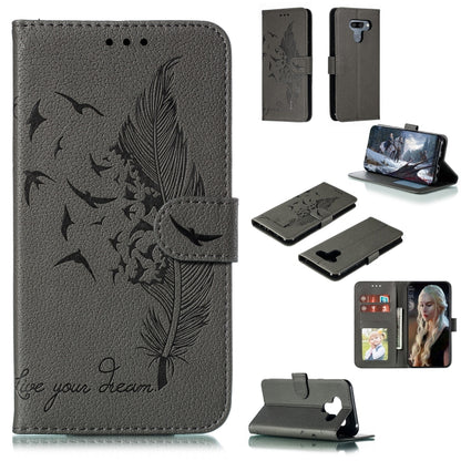 Gray feather-embossed flip leather wallet case with card slots and phone holder