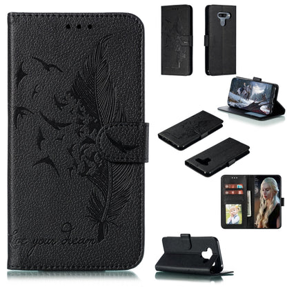 Black feather-embossed flip leather wallet case with card slots and phone holder