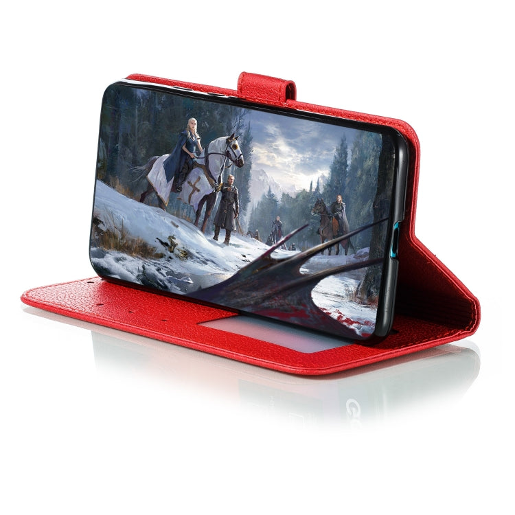 Red faux-leather flip phone case used as a landscape stand for viewing.