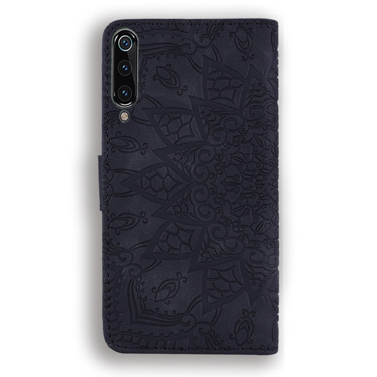 Embossed leather wallet phone case with textured pattern, dark navy, phone camera cutouts
