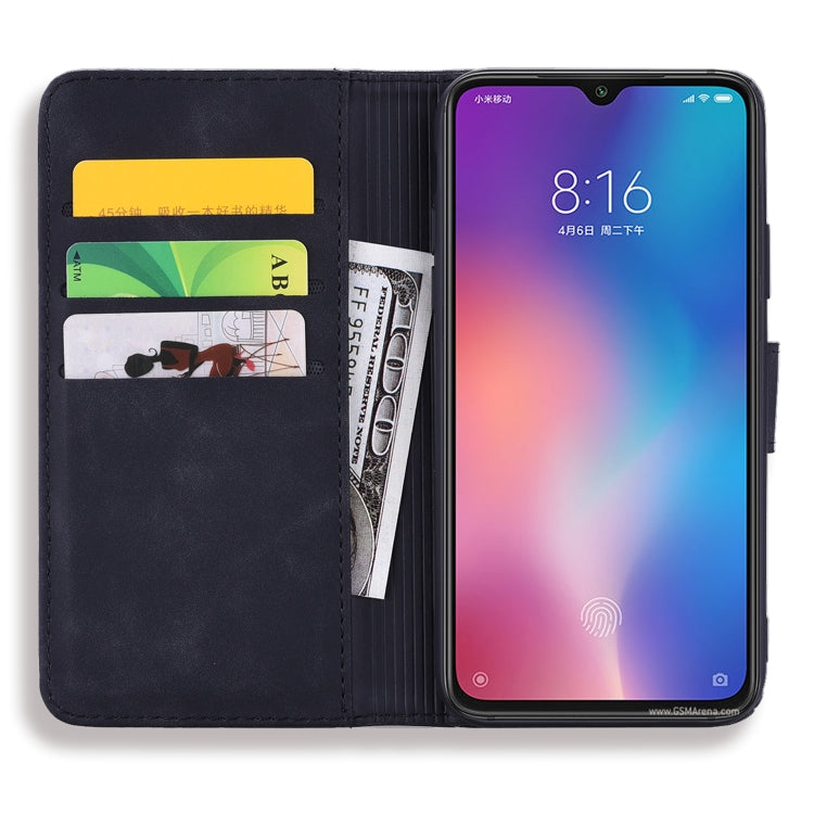 Embossed leather wallet phone case, dark navy, open view showing card slots and holder