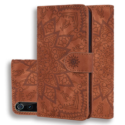 Embossed leather wallet phone case, brown flip cover with textured pattern and card holder strap