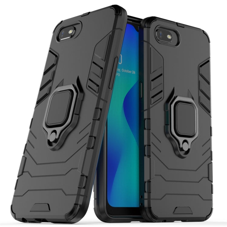 Black protective phone case with magnetic ring holder and textured grip side panels