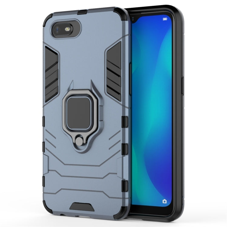 Black shockproof phone case with magnetic ring holder and textured impact-resistant pattern
