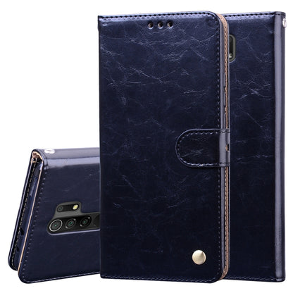 Navy textured flip leather phone case with card holder tab and snap closure