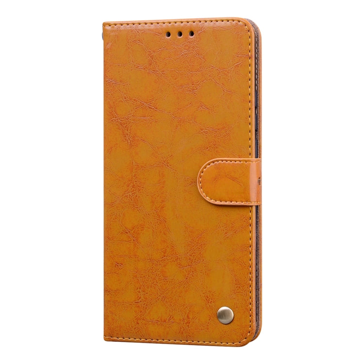 Orange textured flip phone case with front card holder tab and snap button