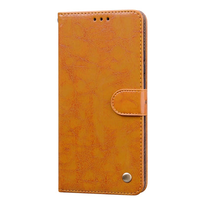 Orange textured flip phone case with front card holder tab and snap button