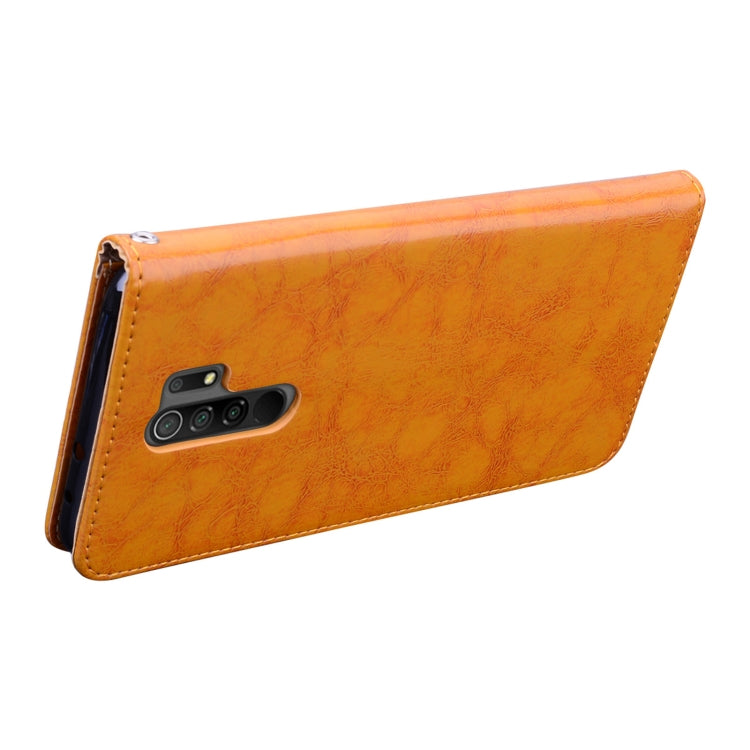 Orange textured flip leather phone case with cutouts and side opening