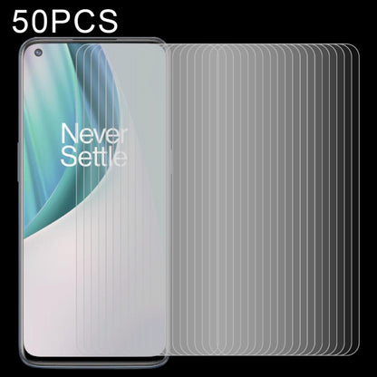 50-pack tempered glass screen protectors layered on a phone front