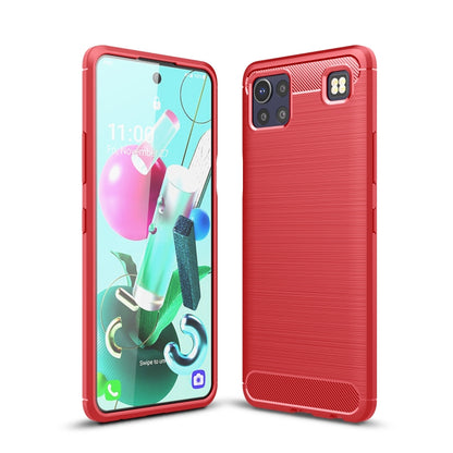 Brushed carbon fiber TPU phone case, red, with camera cutout and raised edges.