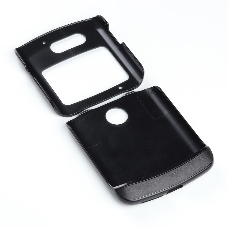 Black leather phone case with camera and speaker cutouts, two-piece protective design.