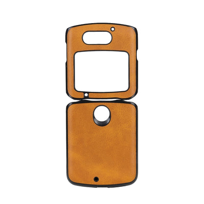 Tan leather phone case for Motorola Razr 5G, with top camera window and bottom speaker cutout.
