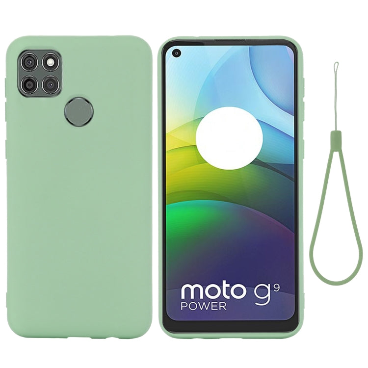 Green silicone phone case on phone back and front display with matching wrist strap