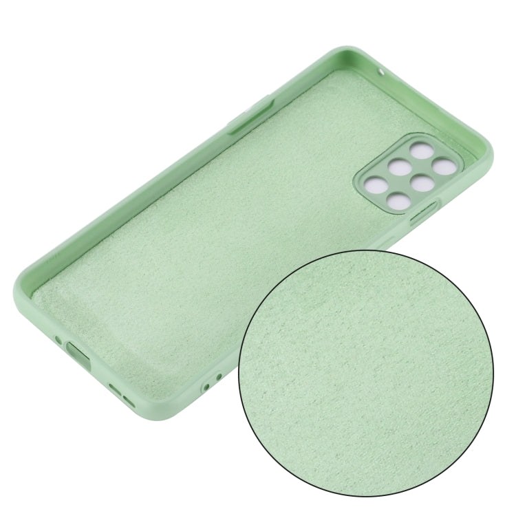 Green silicone phone case with raised camera cutout and smooth full-coverage fit