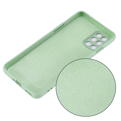 Green silicone phone case with raised camera cutout and smooth full-coverage fit