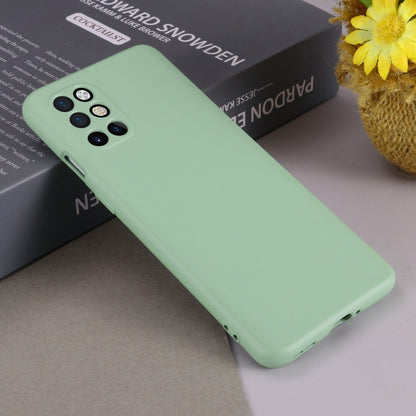 Green liquid silicone phone case for back, with camera opening included